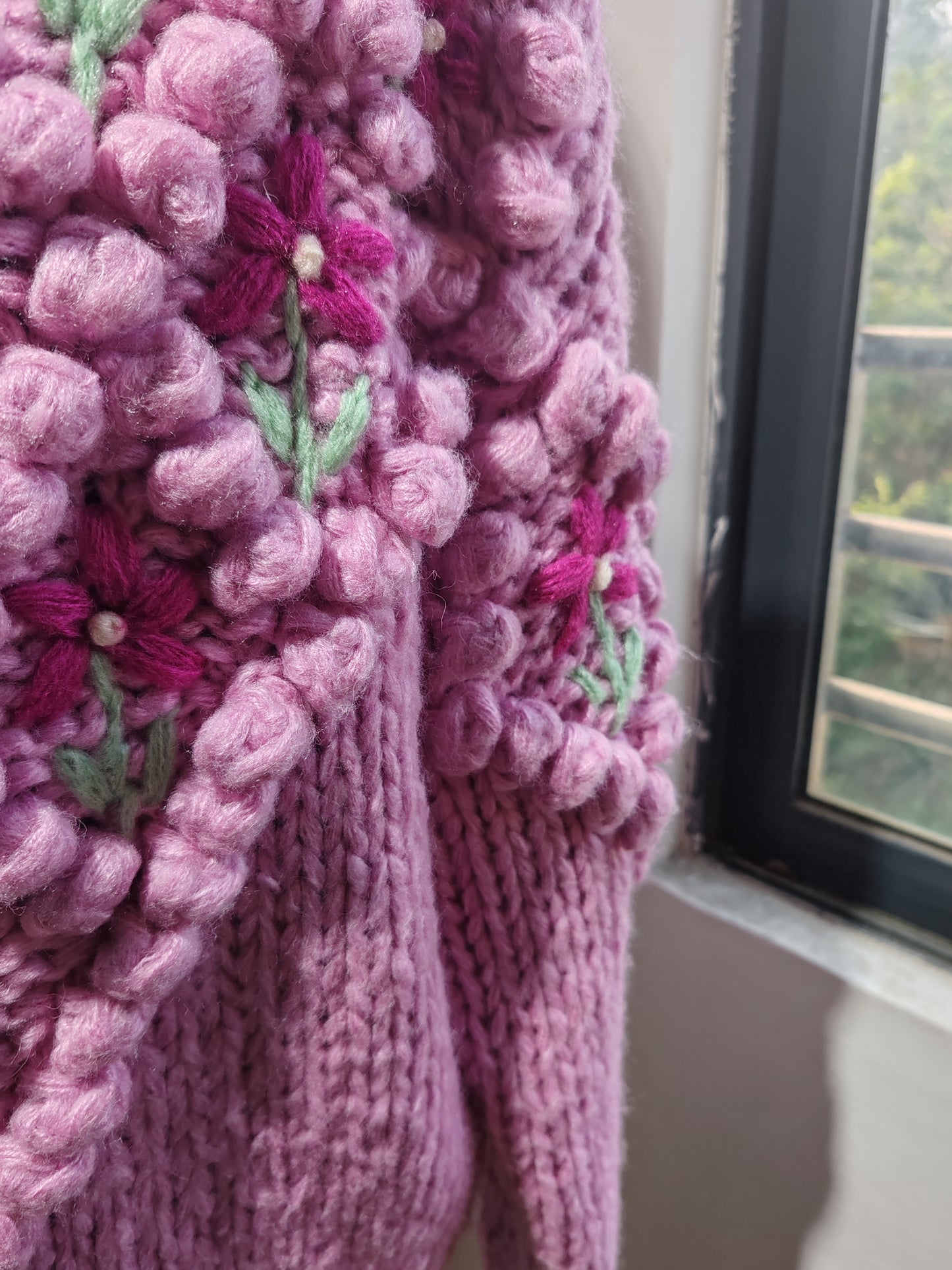 Heavy-duty handmade floral knitted cardigan