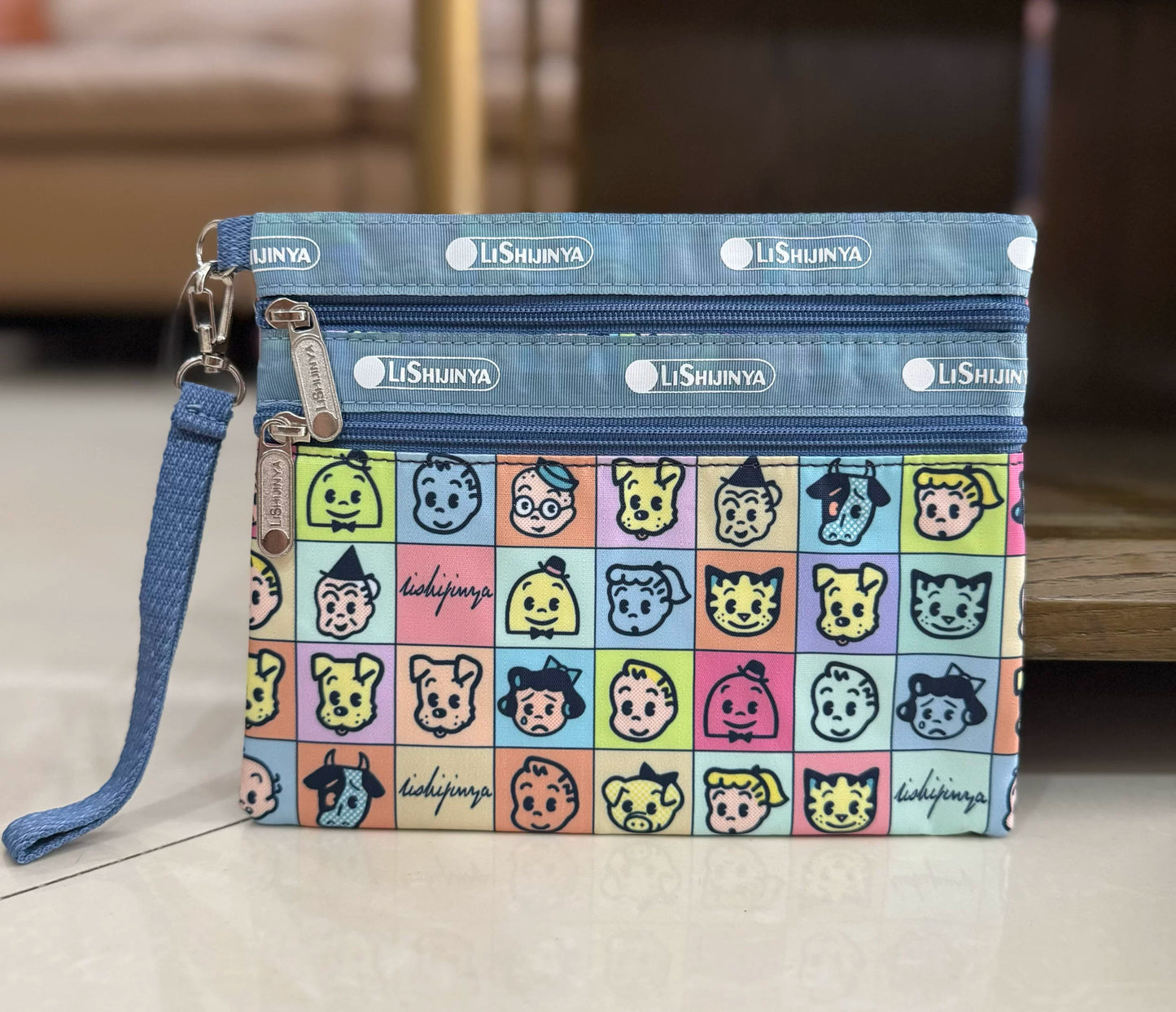 Women's hand rope, hand bag, two zippers, cosmetic bag, change bag, mobile phone bag.