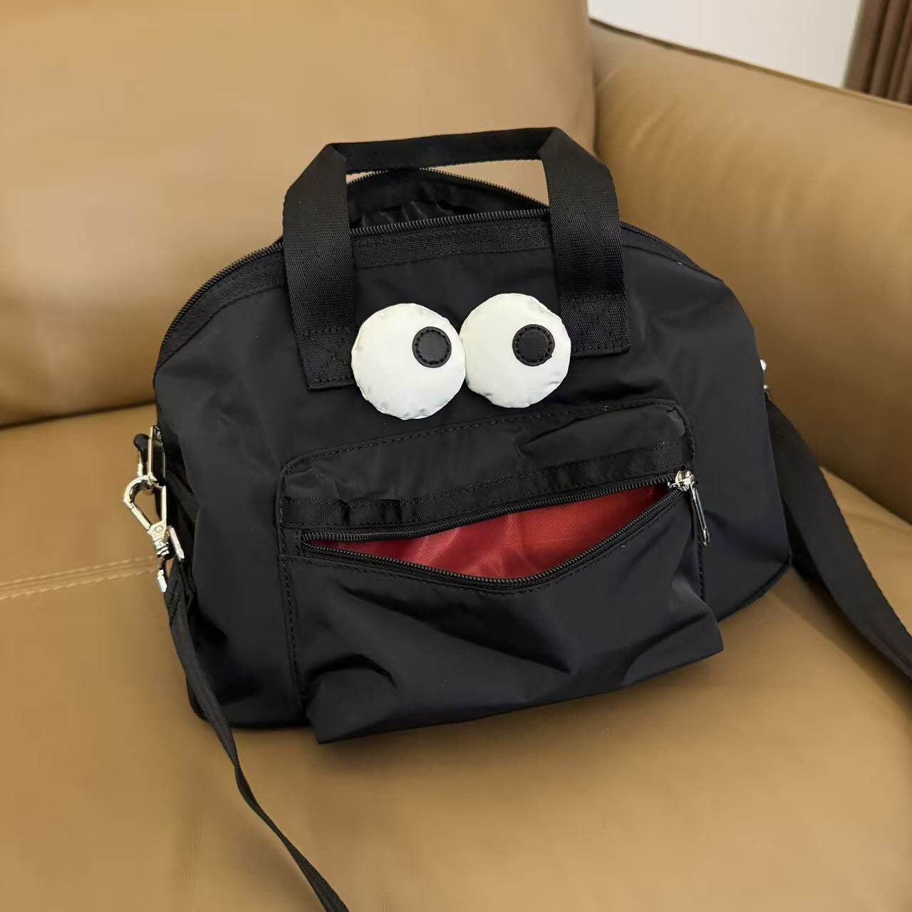 Cartoon unmarked cute big eyes tote portable messenger bag casual commuter bag X153 size 25/20/13