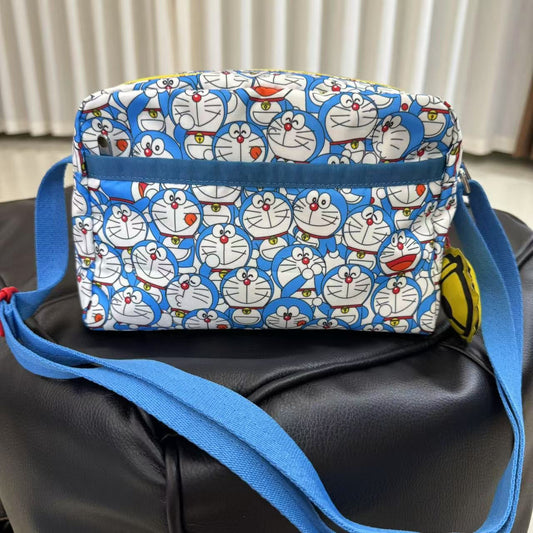 Cartoon fashion shoulder messenger bag multi-compartment large capacity lightweight 2434 printed bag anti-splashing water