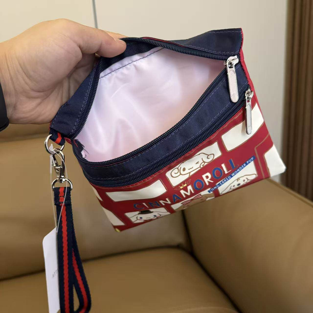 Women's hand rope, hand bag, two zippers, cosmetic bag, change bag, mobile phone bag.