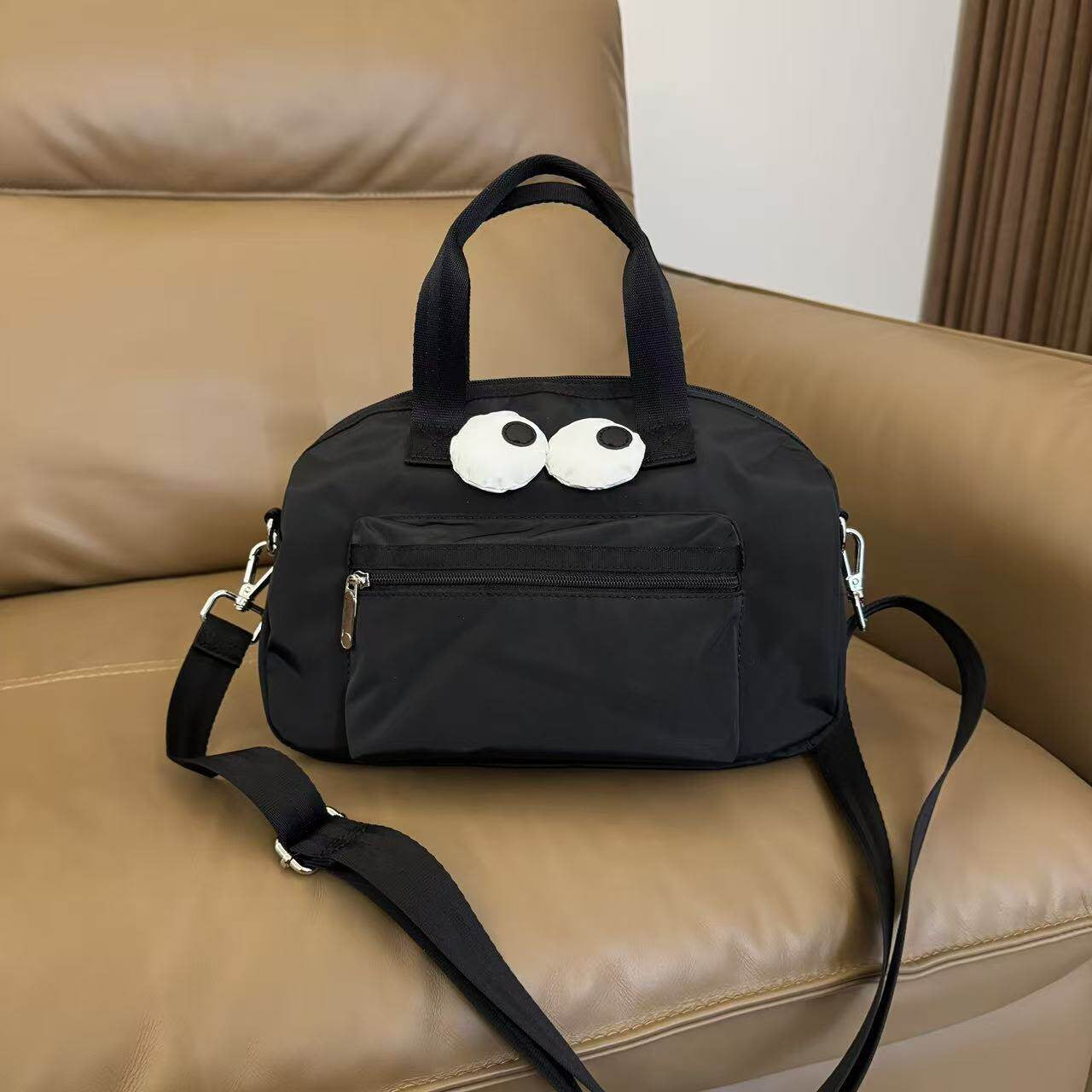 Cartoon unmarked cute big eyes tote portable messenger bag casual commuter bag X153 size 25/20/13