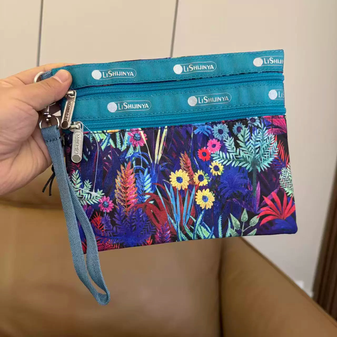 Cartoon women's hand rope, hand bag, two zippers, cosmetic bag, change bag, mobile phone bag.