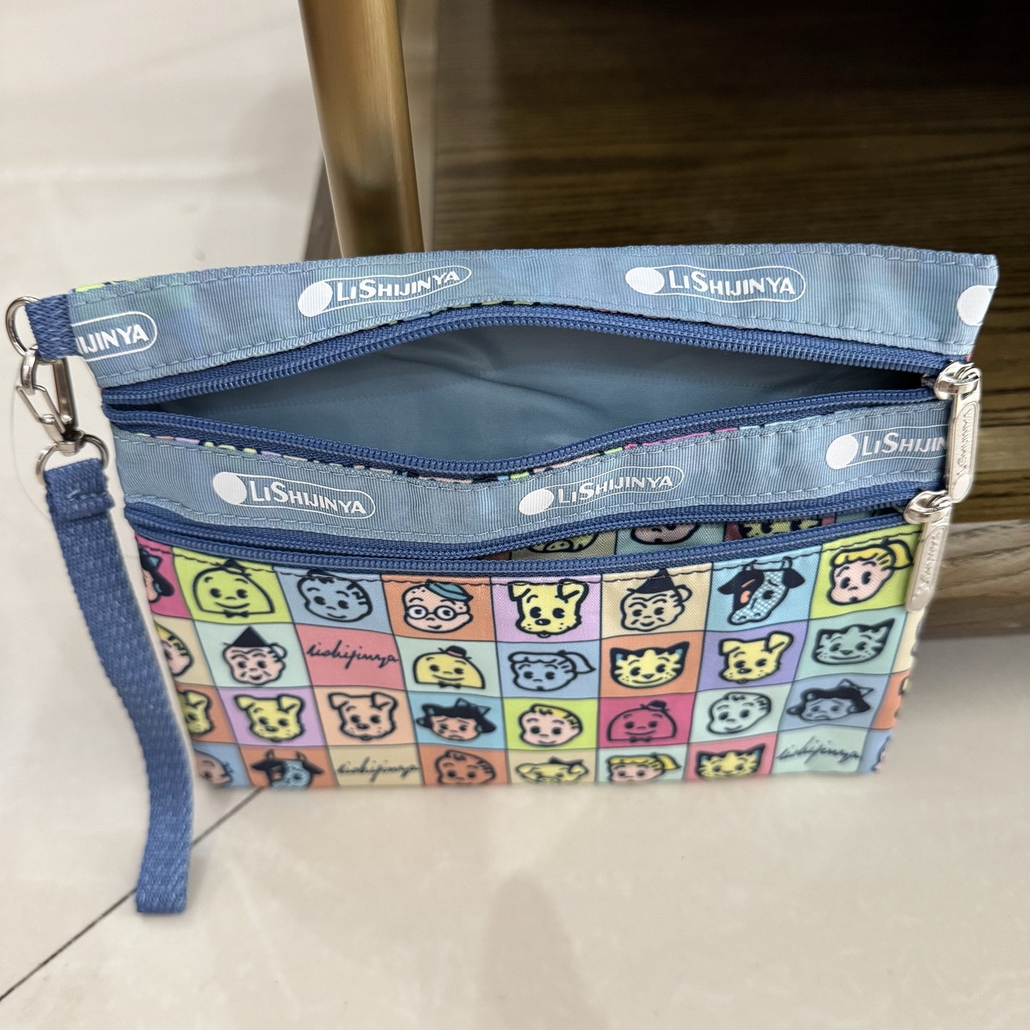 Women's hand rope, hand bag, two zippers, cosmetic bag, change bag, mobile phone bag.