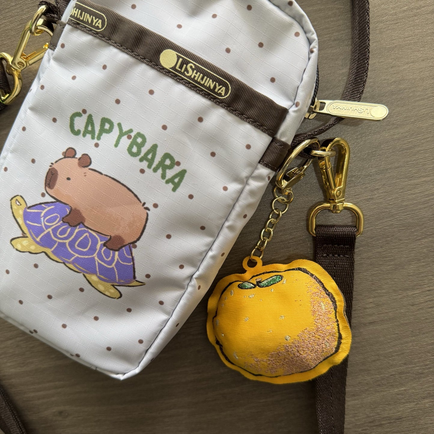 LOGO English different new shoulder messenger handbag kapibara cartoon mobile phone bag 3505