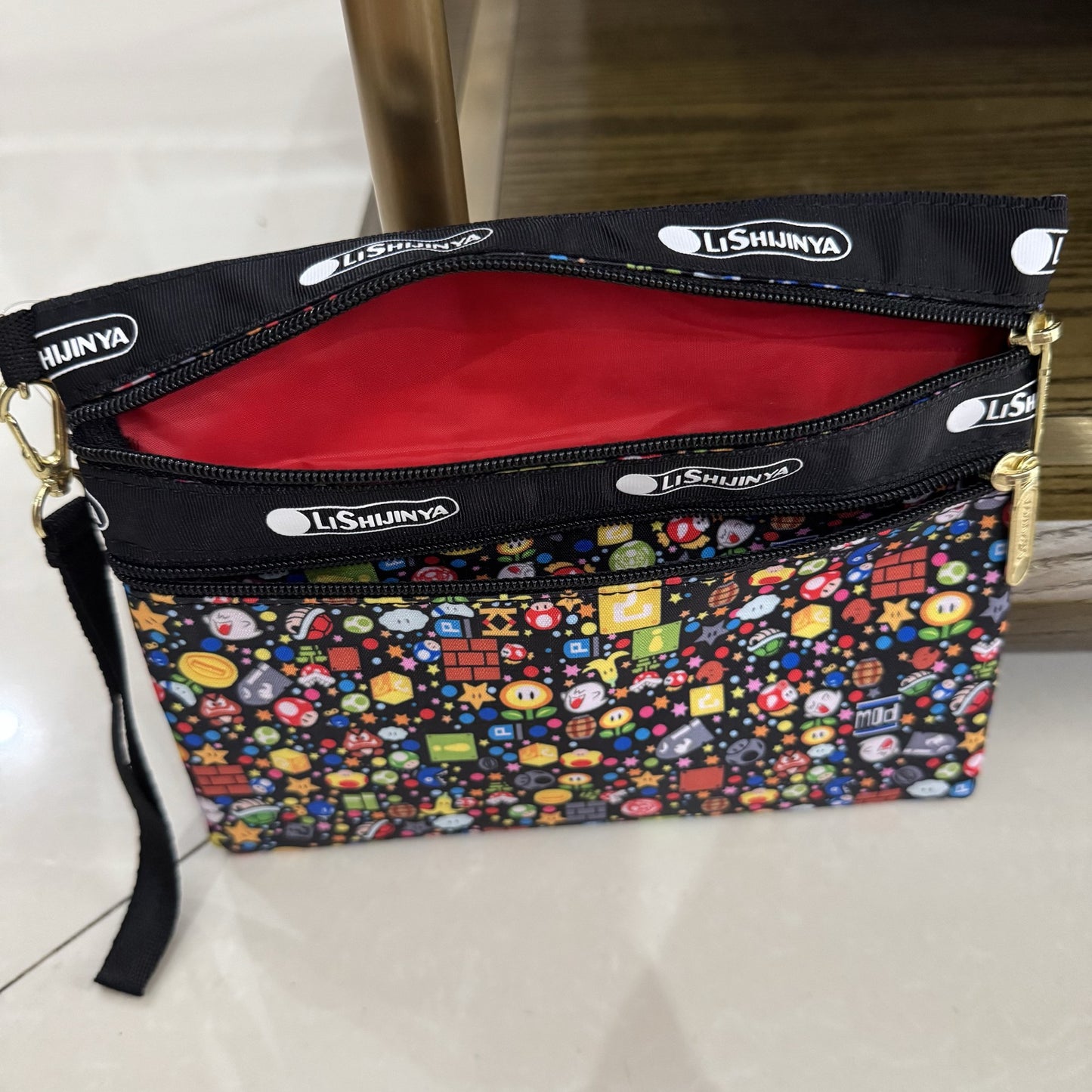 Women's hand rope, hand bag, two zippers, cosmetic bag, change bag, mobile phone bag.