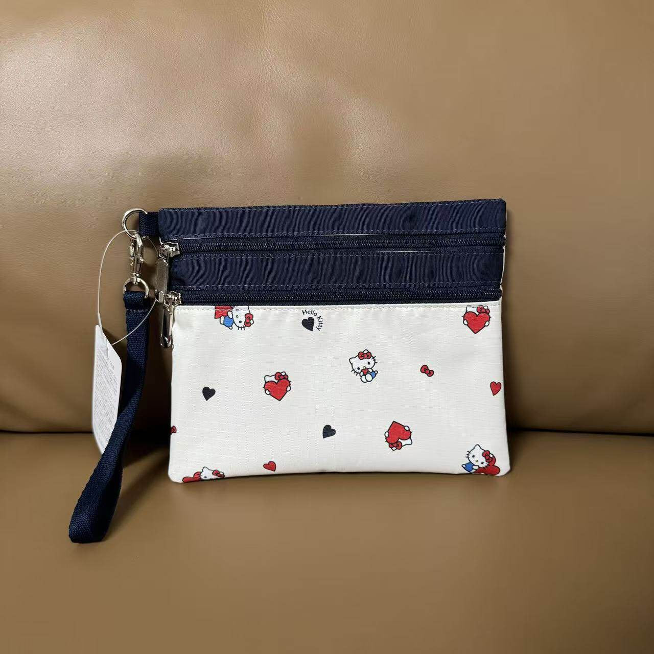 Women's hand rope, hand bag, two zippers, cosmetic bag, change bag, mobile phone bag.