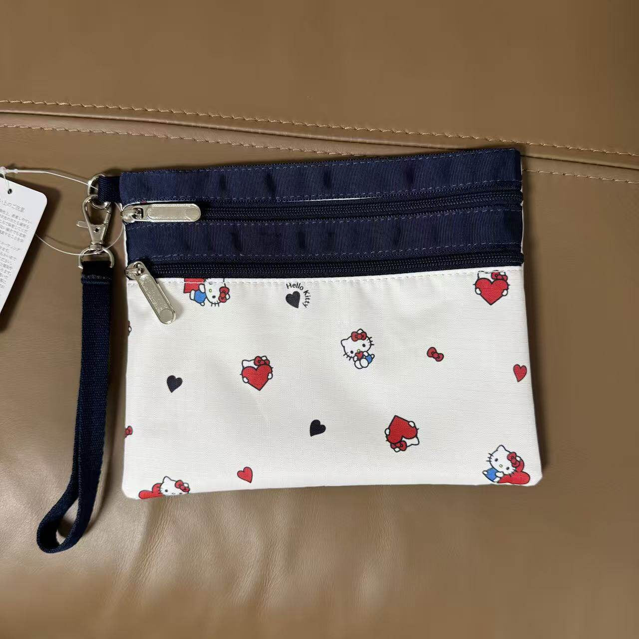 Women's hand rope, hand bag, two zippers, cosmetic bag, change bag, mobile phone bag.